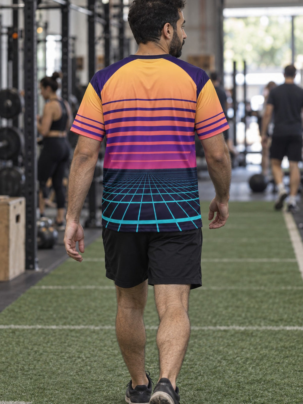 Man training in the Synthwave Grid men's sports jersey with the Vantacore V emblem on the left chest – back view