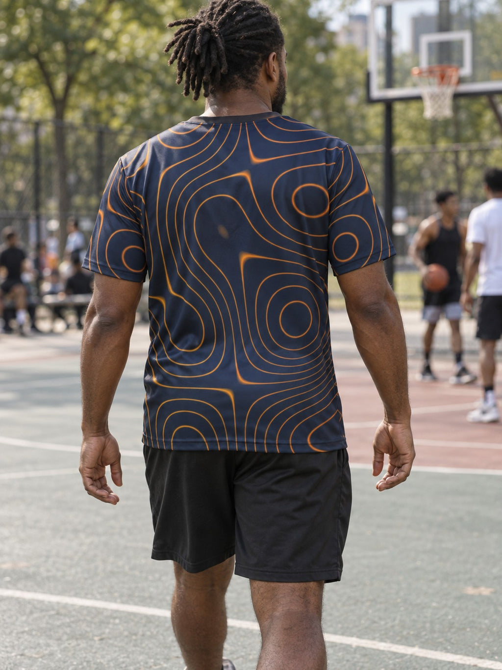 Man training in the Topo Blaze men's sports jersey with the Vantacore V emblem on the left chest – back view