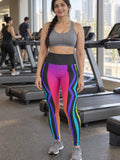 Woman wearing the Prism Velocity High-Waisted Yoga Leggings with the Vantacore V emblem on the hip – front view