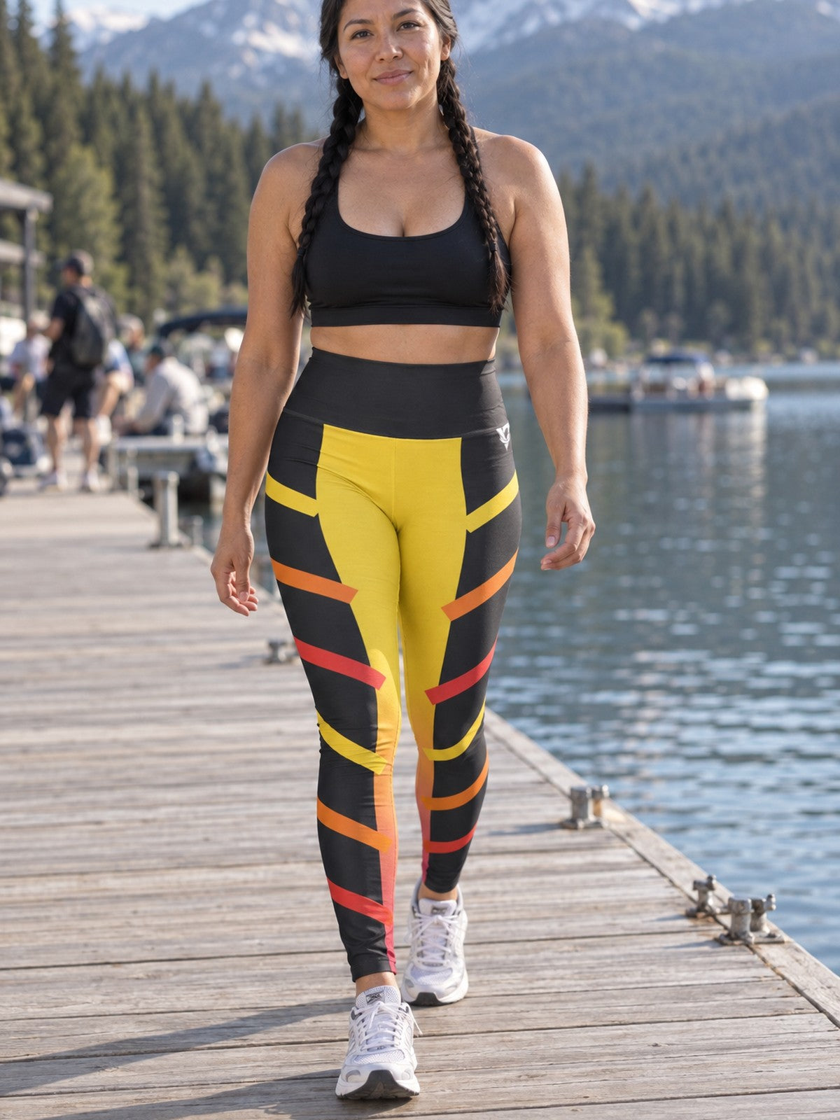 Woman wearing the Solar Pulse High-Waisted Yoga Leggings with the Vantacore V emblem on the hip – front view