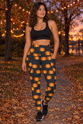 Halloween Graveyard Grey Jack-O'-Lantern leggings with pockets worn on a model