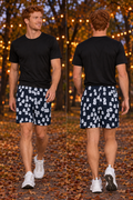 Men's Halloween Ghostly Night Ghost Parade athletic multipurpose shorts worn on a model