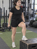 Women's Multipurpose Athletic Shorts with Pockets | Black – gym training, front view