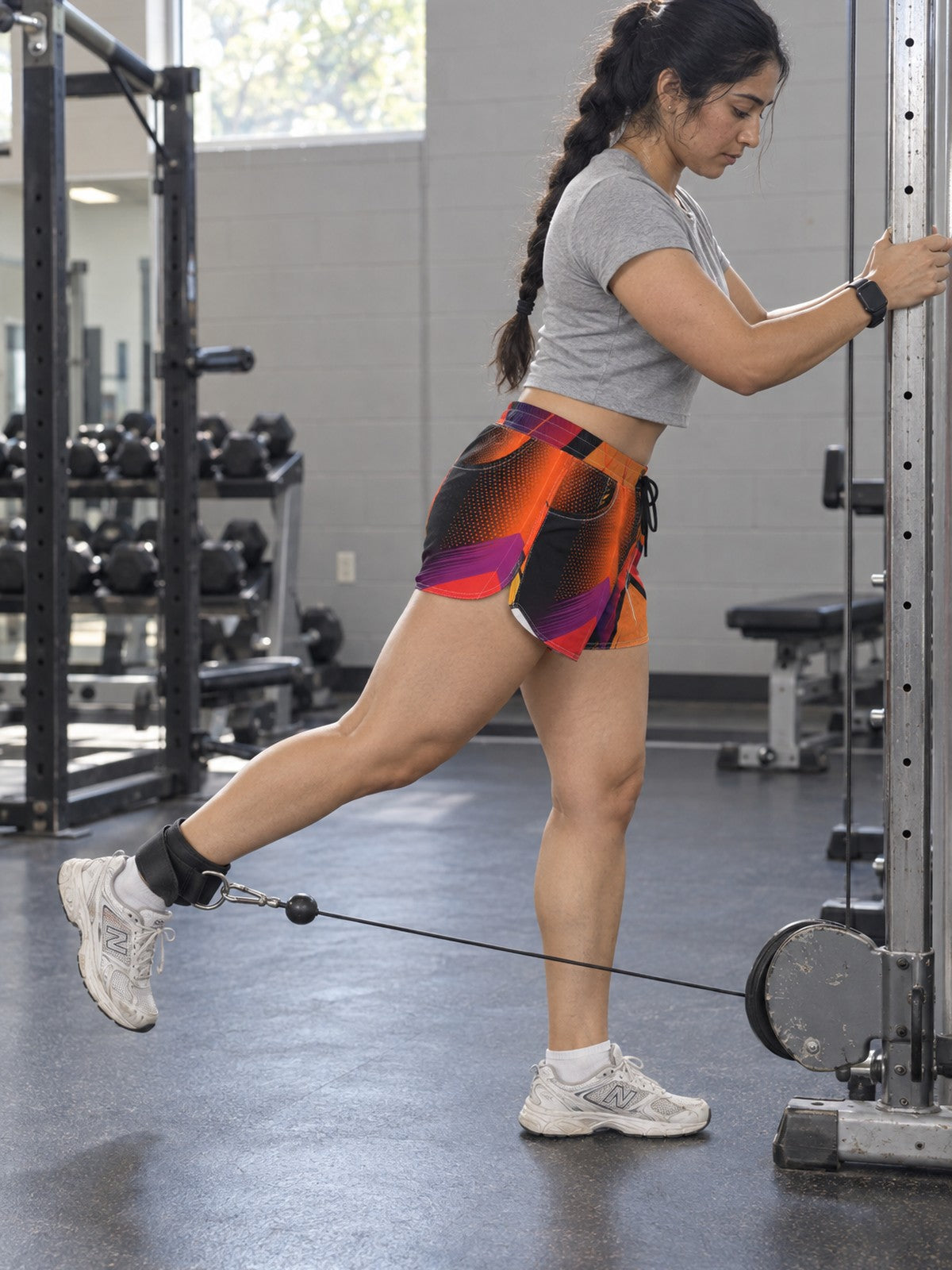 Women's Multipurpose Athletic Shorts with Pockets | Abstract Vibrant Geo – gym training, side view