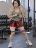 Women's Multipurpose Athletic Shorts with Pockets | Red Geometric – gym training, front view