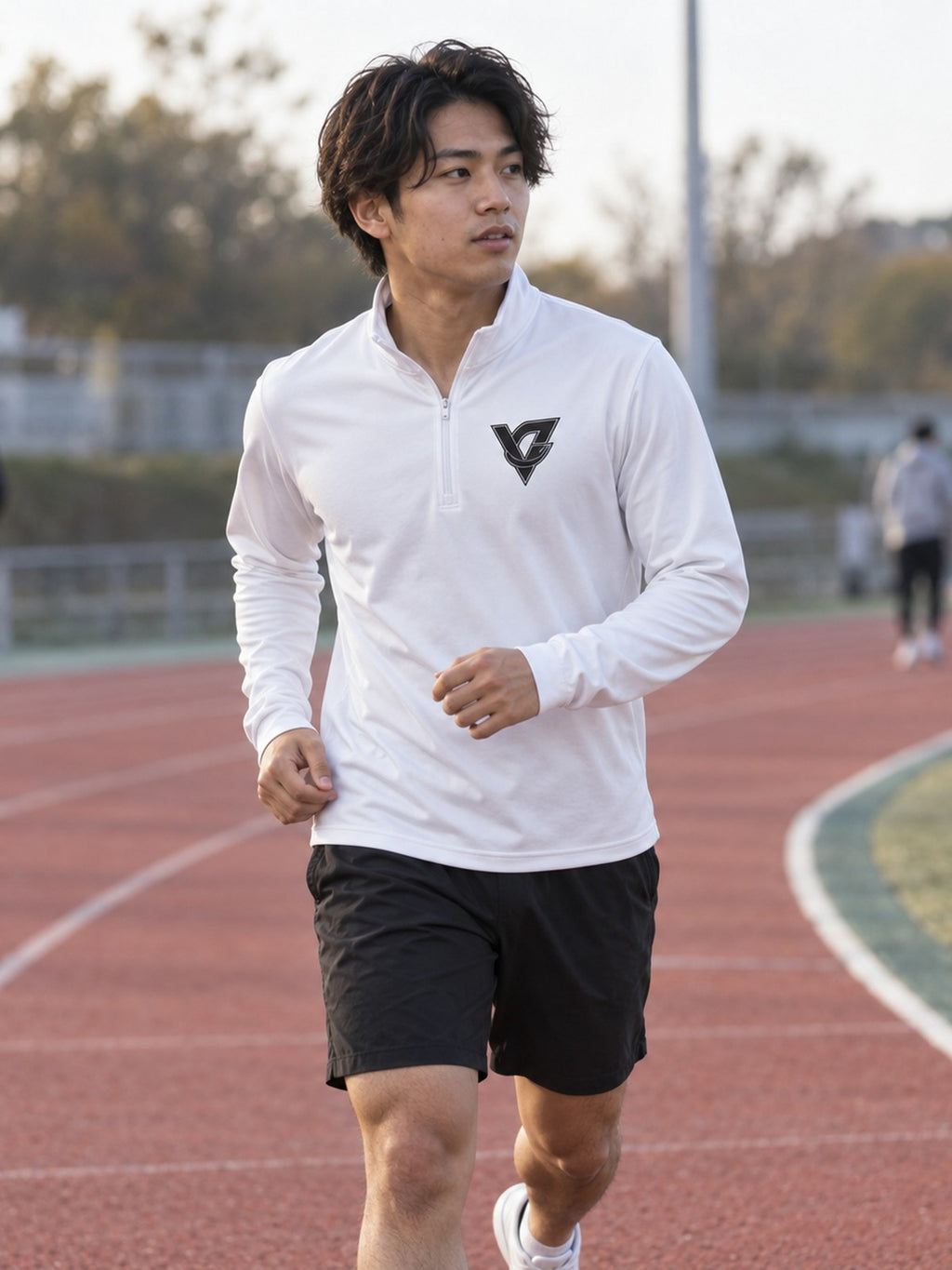 Man wearing the Vantacore Vantacore Athletics Quarter-Zip Pullover