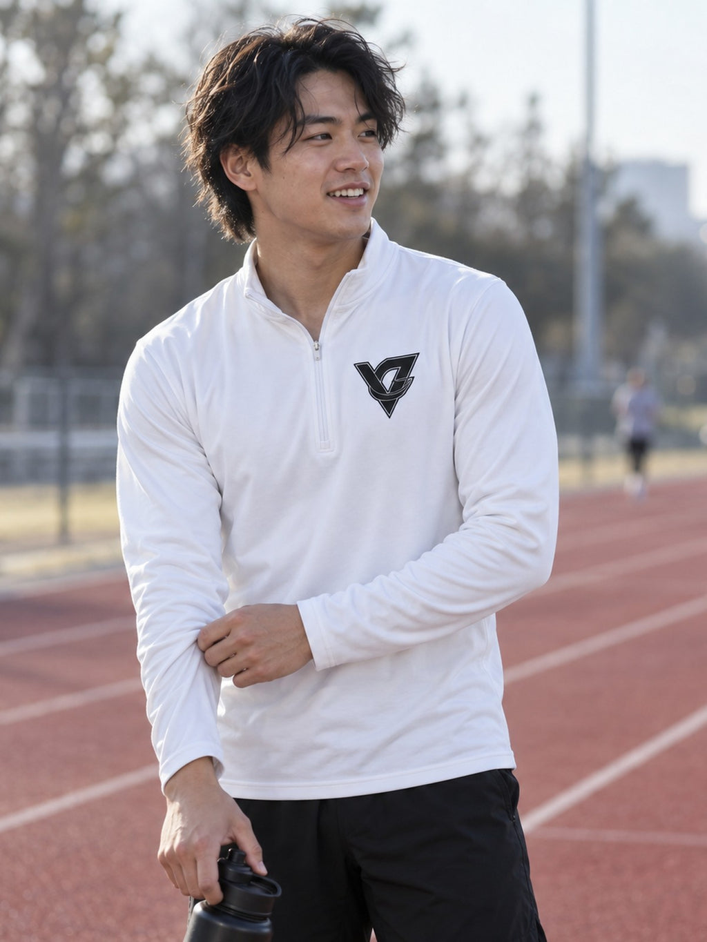 Man wearing the Vantacore Vantacore Athletics Quarter-Zip Pullover