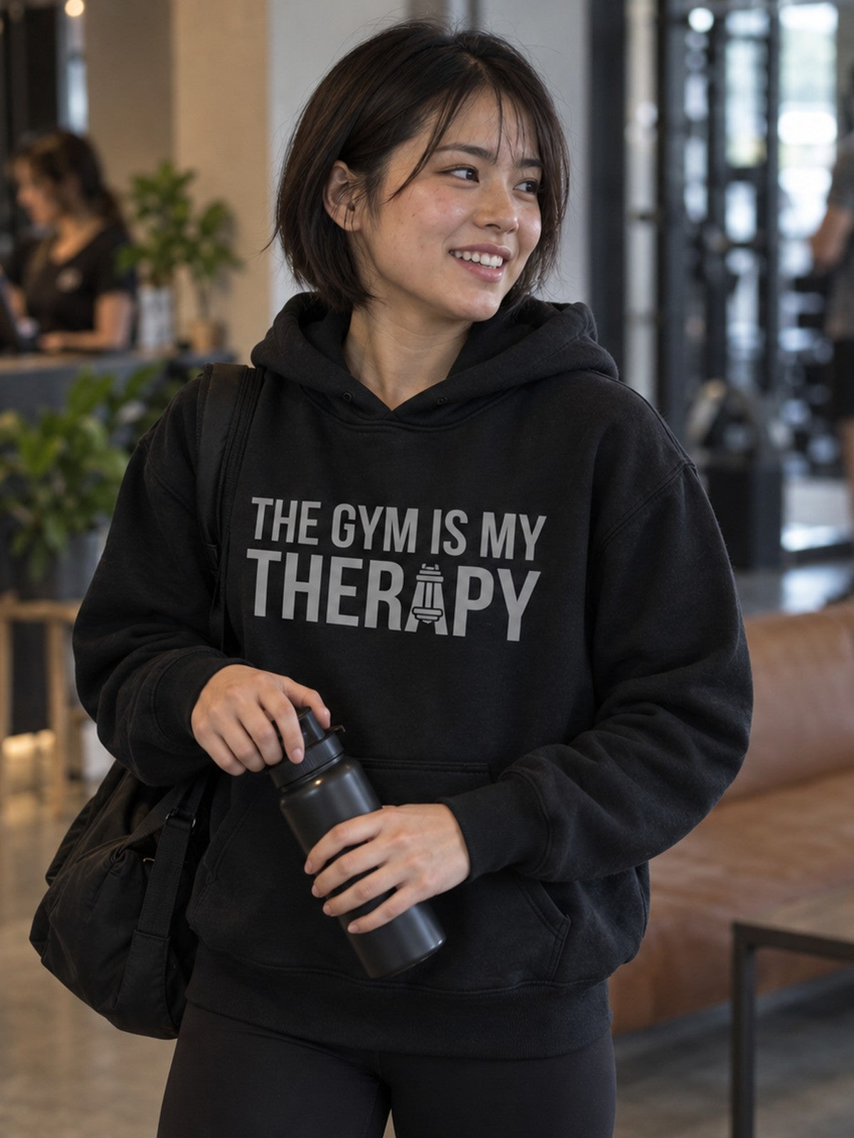 Woman wearing the Vantacore Gym Is My Therapy Hoodie