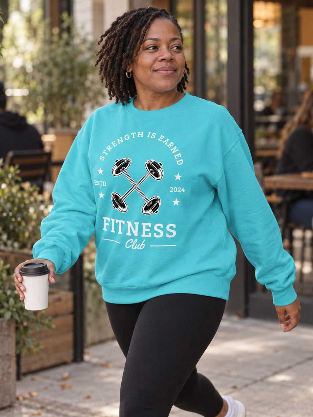 Woman wearing the Vantacore Fitness Club Sweatshirt