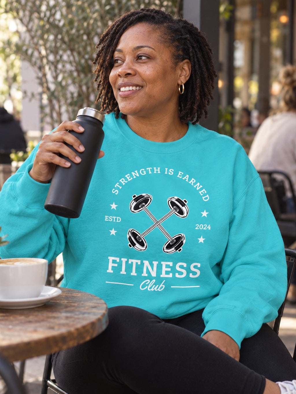Woman wearing the Vantacore Fitness Club Sweatshirt