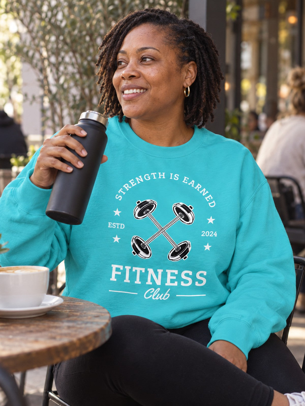Woman wearing the Vantacore Fitness Club Sweatshirt