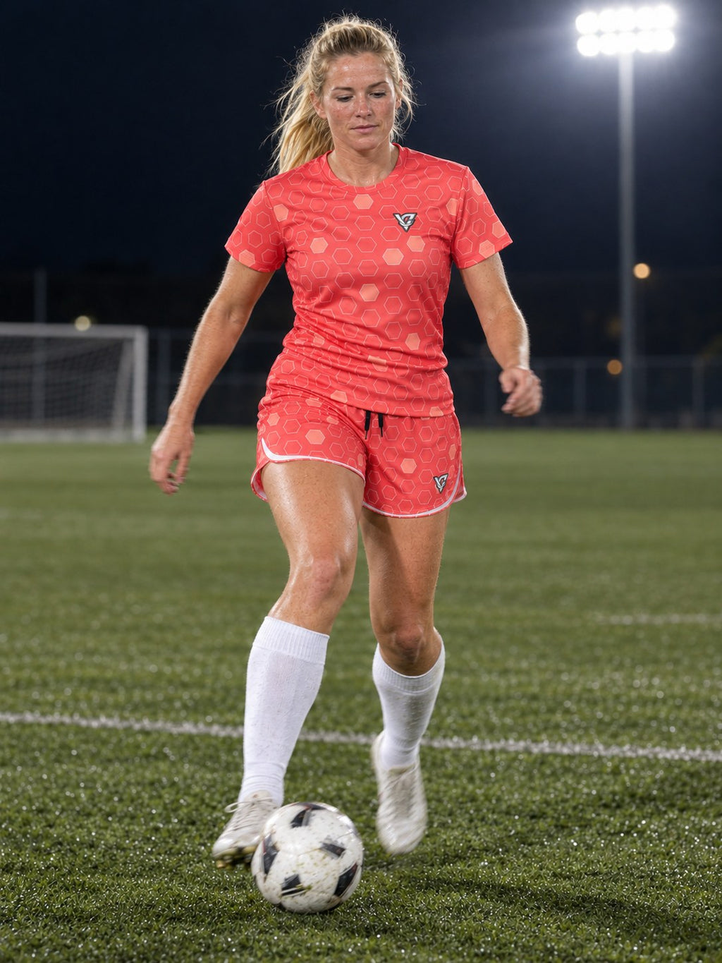 Soccer Hot Coral Hex Pitch Women's Sports Jersey, in action