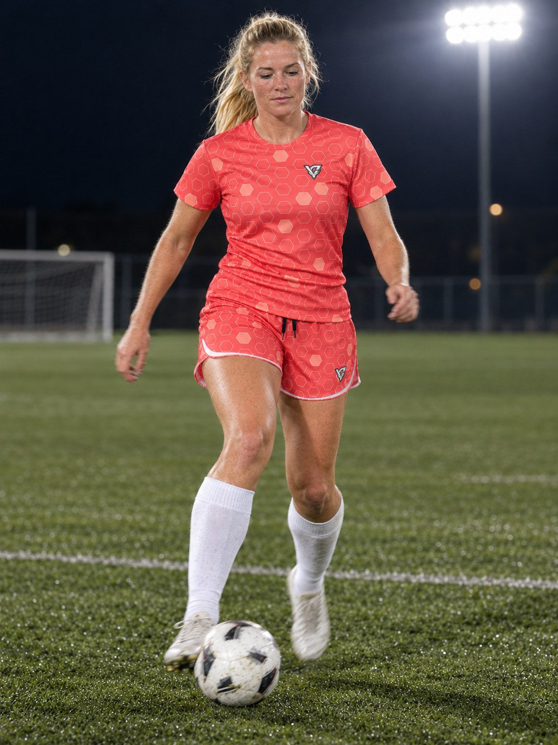 Soccer Hot Coral Hex Pitch Women's Sports Jersey, in action