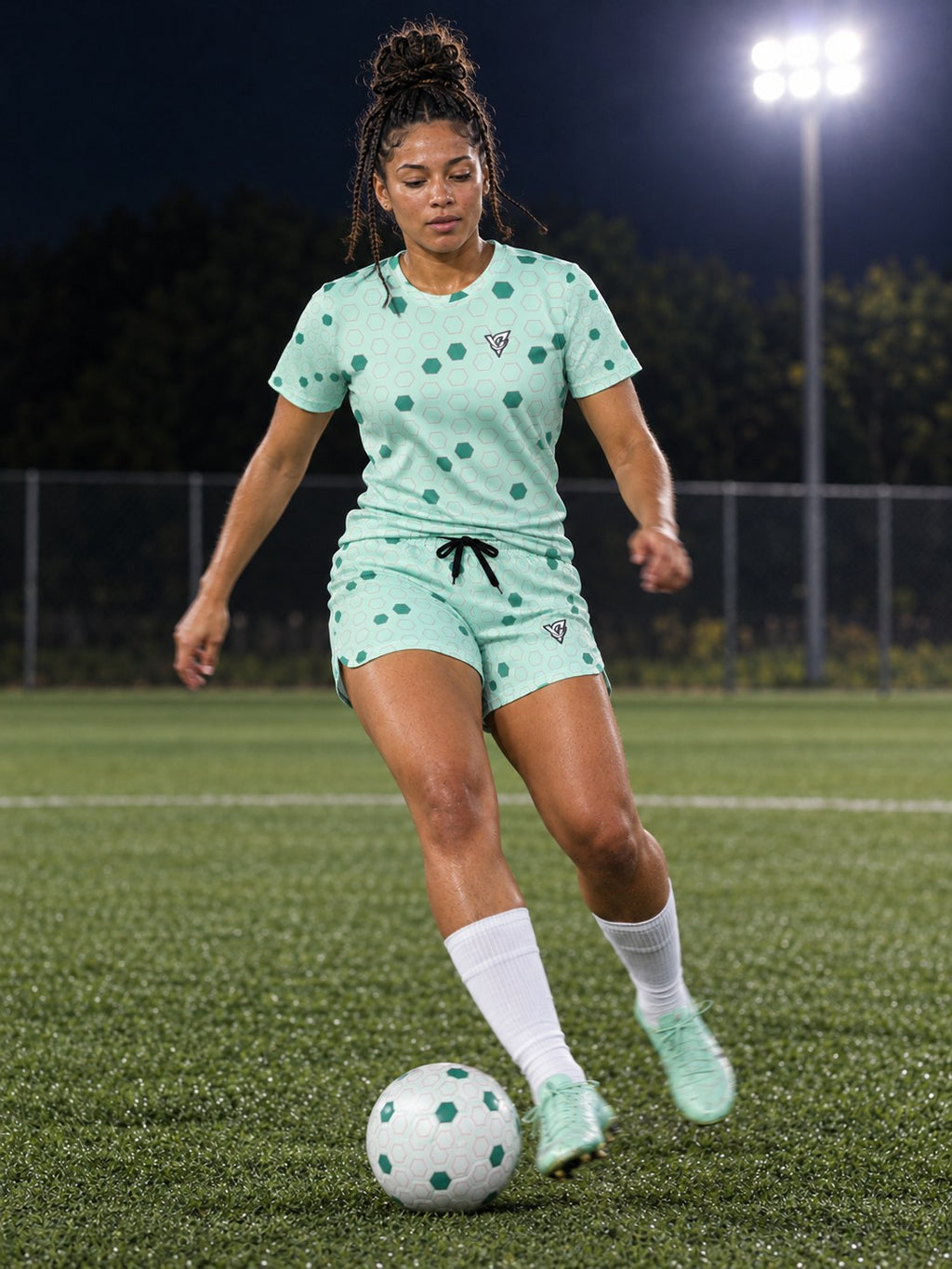 Soccer Mint Glow Hex Pitch Women's Athletic Shorts with Pockets, in action