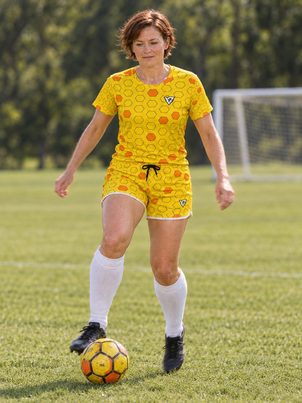 Soccer Neon Citrus Hex Pitch Women's Athletic Shorts with Pockets, in action