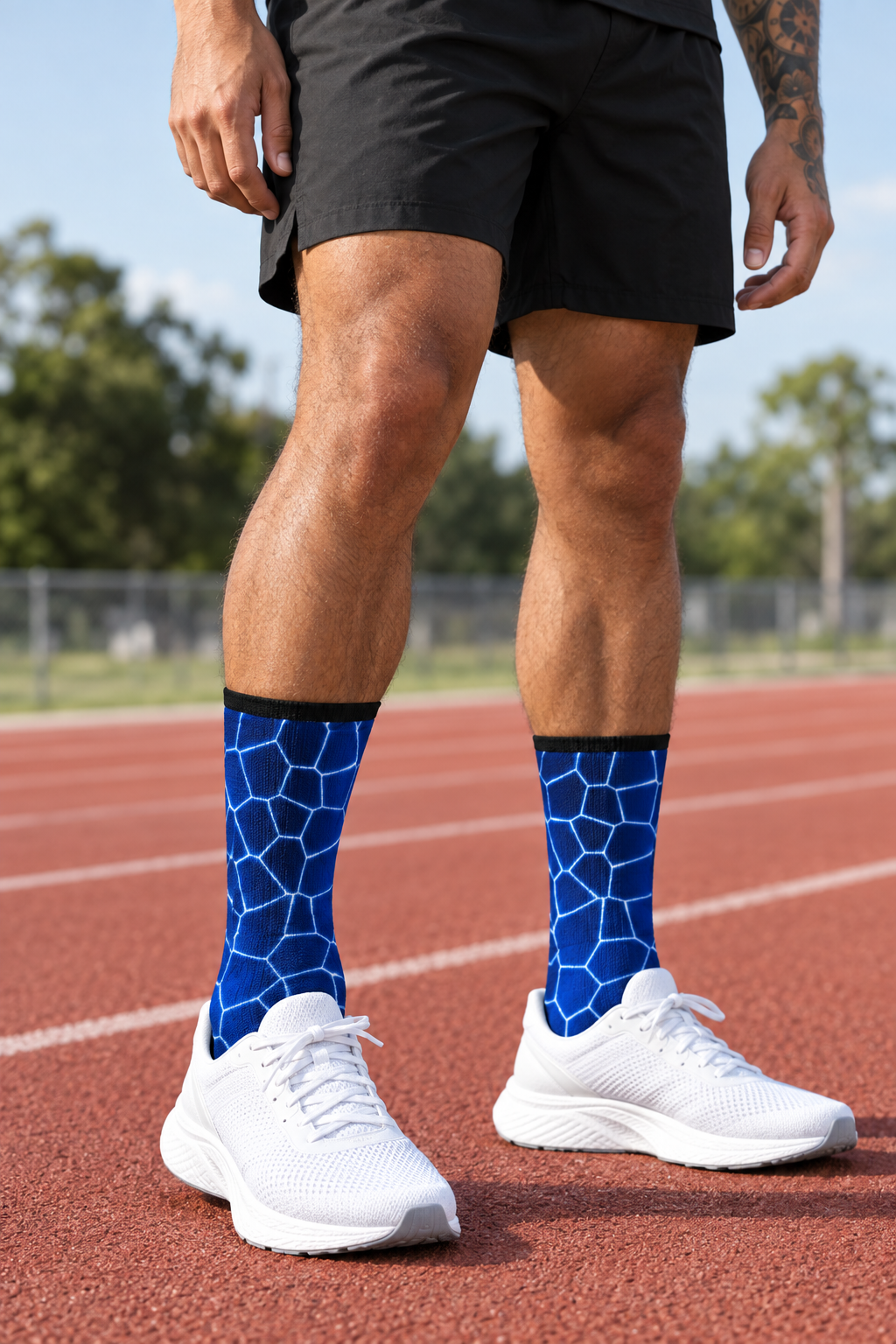 Cobalt Rift crew-length athletic socks worn on a model