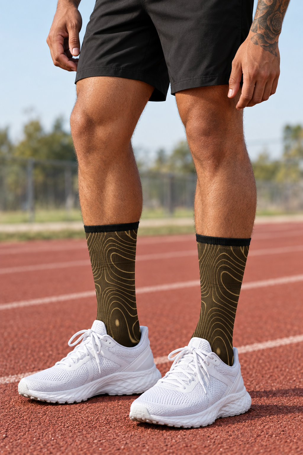 Sandstorm Topo crew-length athletic socks worn on a model