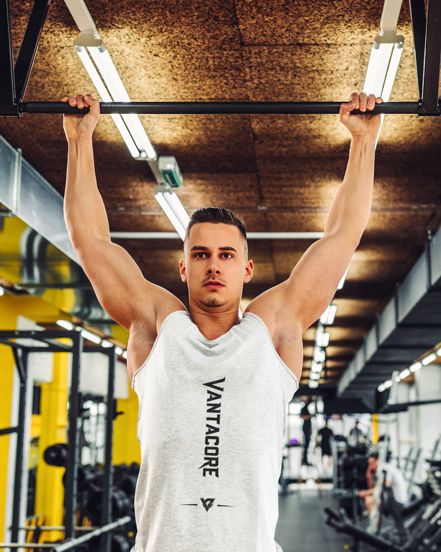Vantacore Vertical Logo Tank Top – Minimalist Gym Tank | Unisex Sleeveless Fitness Shirt