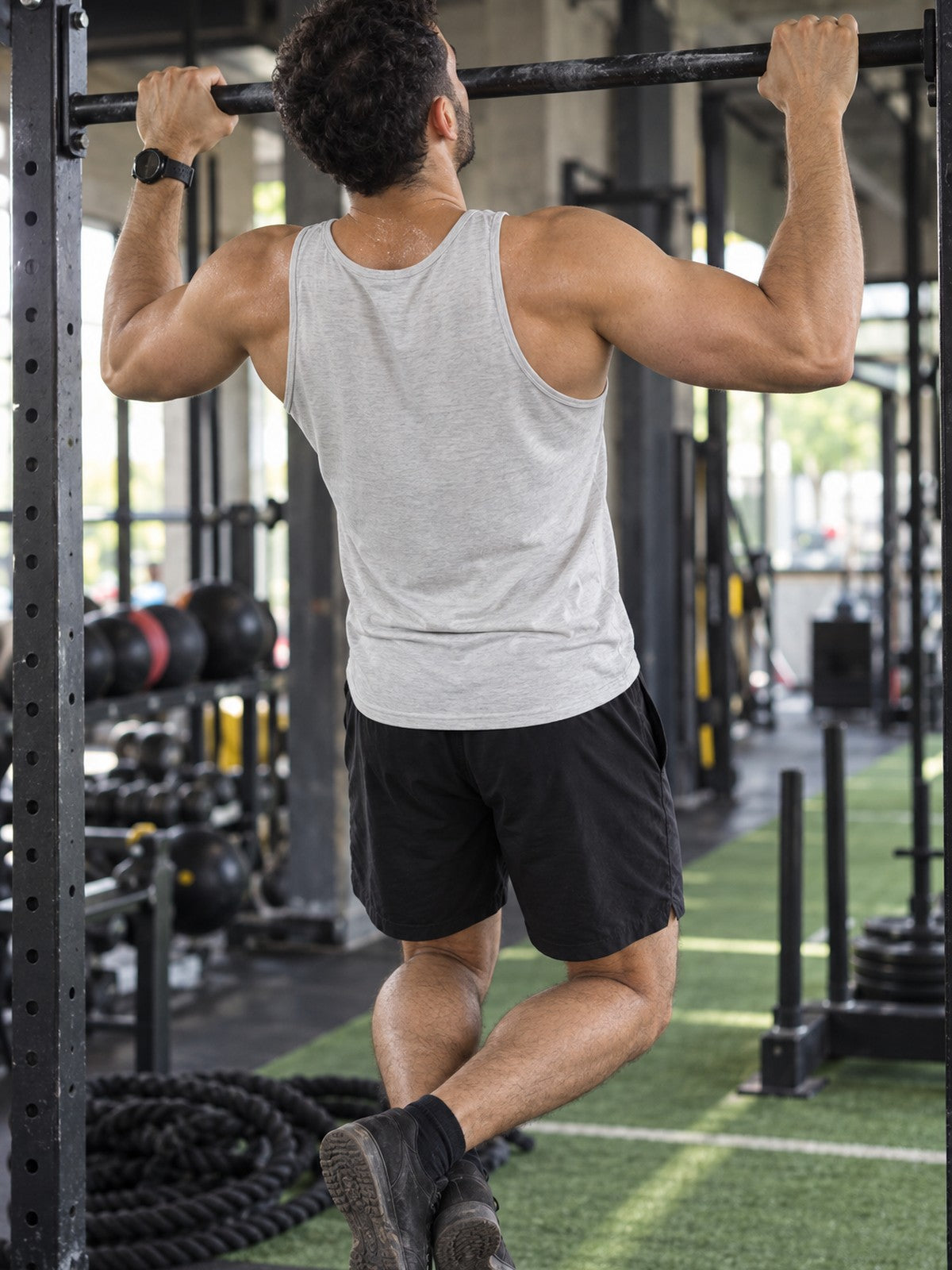 Vantacore Vertical Logo Tank Top – Minimalist Gym Tank | Unisex Sleeveless Fitness Shirt – gym training, rear view