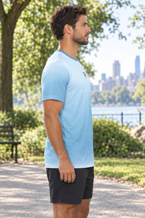 Arctic Ombre Multipurpose Athletic Shirt, AI-generated side-profile product mockup on a fictional adult model