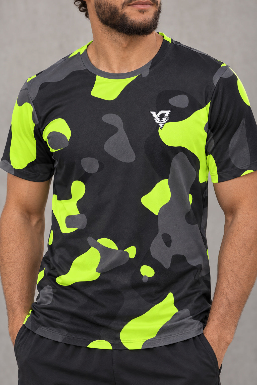 Graphite Camo Multipurpose Athletic Shirt, AI-generated realistic detail mockup on a fictional adult model