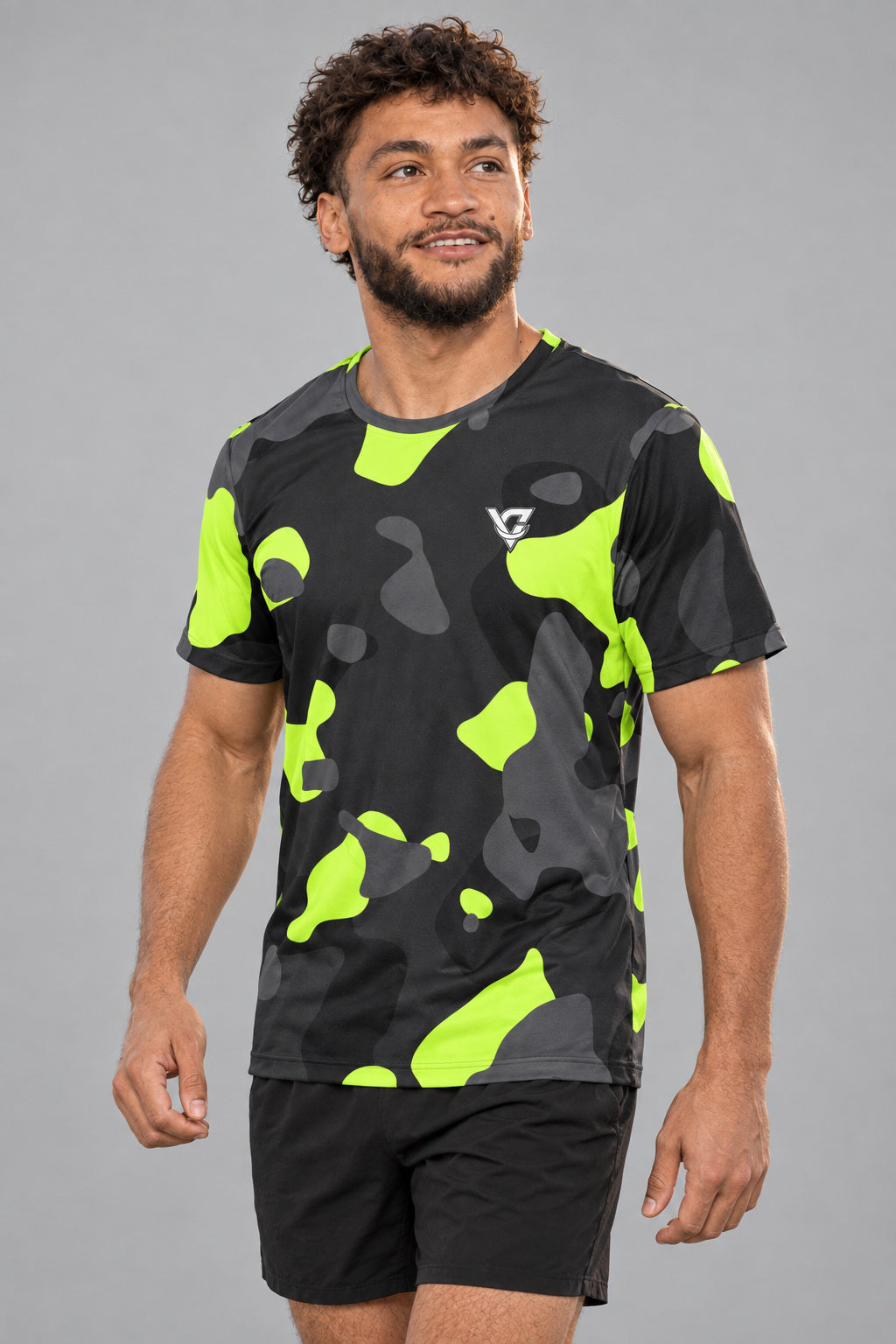 Graphite Camo Multipurpose Athletic Shirt, AI-generated realistic three-quarter mockup on a fictional adult model