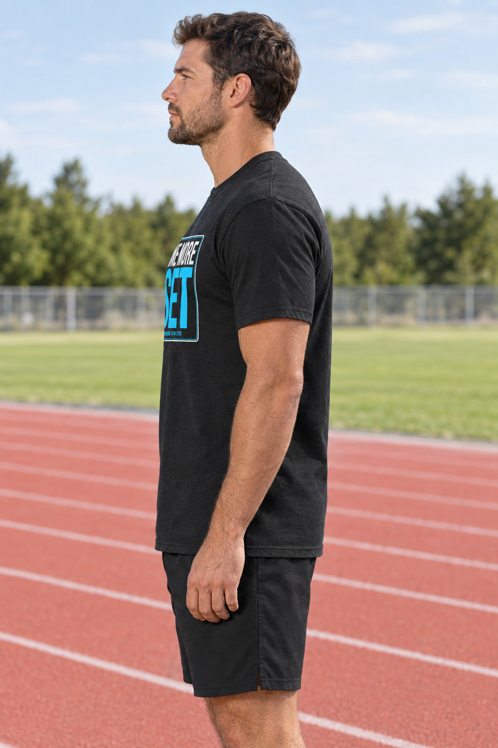 One More Set | Men's Graphic Gym T-Shirt, AI-generated side-profile product mockup on a fictional adult model