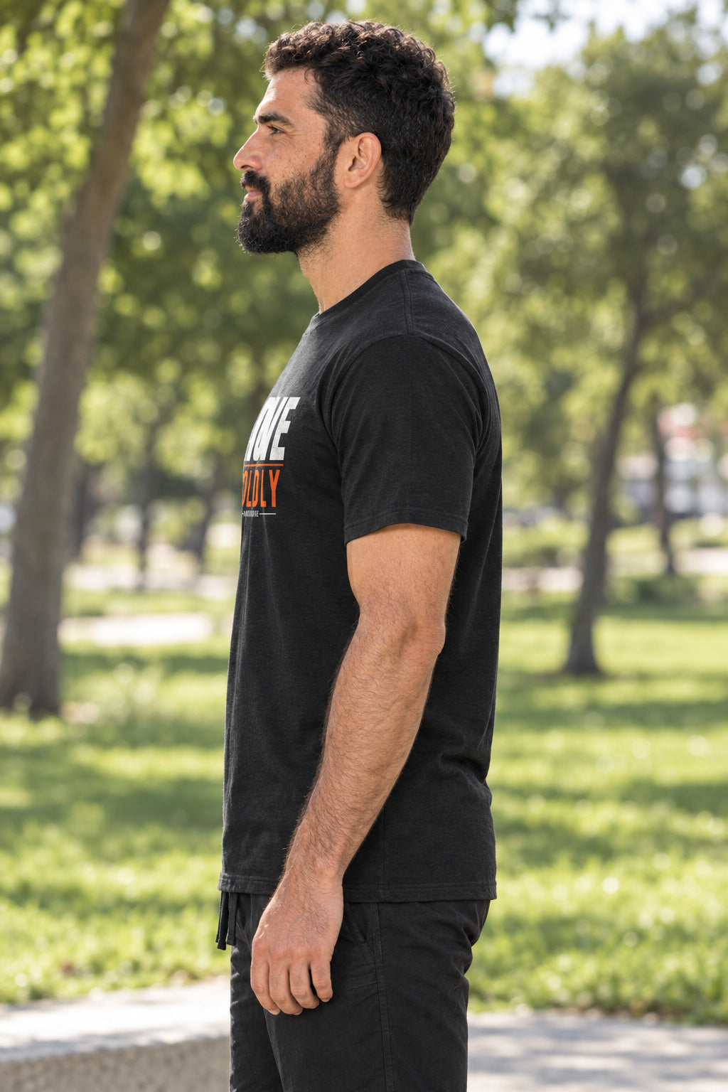 Move Boldly | Men's Graphic Gym T-Shirt, AI-generated side-profile product mockup on a fictional adult model