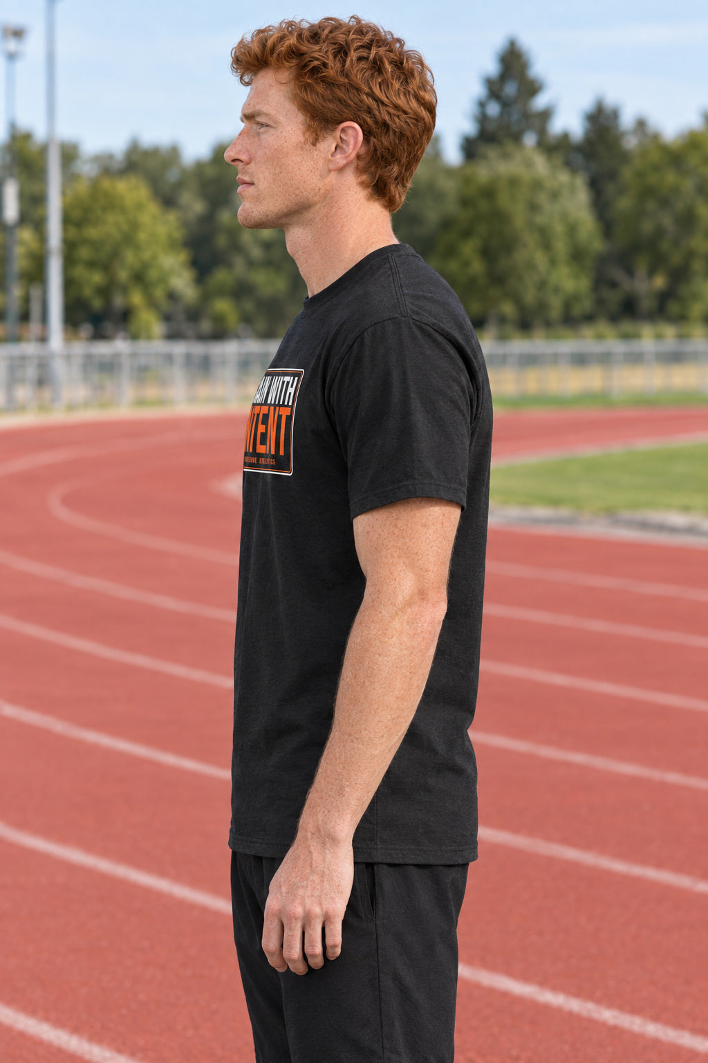 Train With Intent | Men's Graphic Gym T-Shirt, AI-generated side-profile product mockup on a fictional adult model
