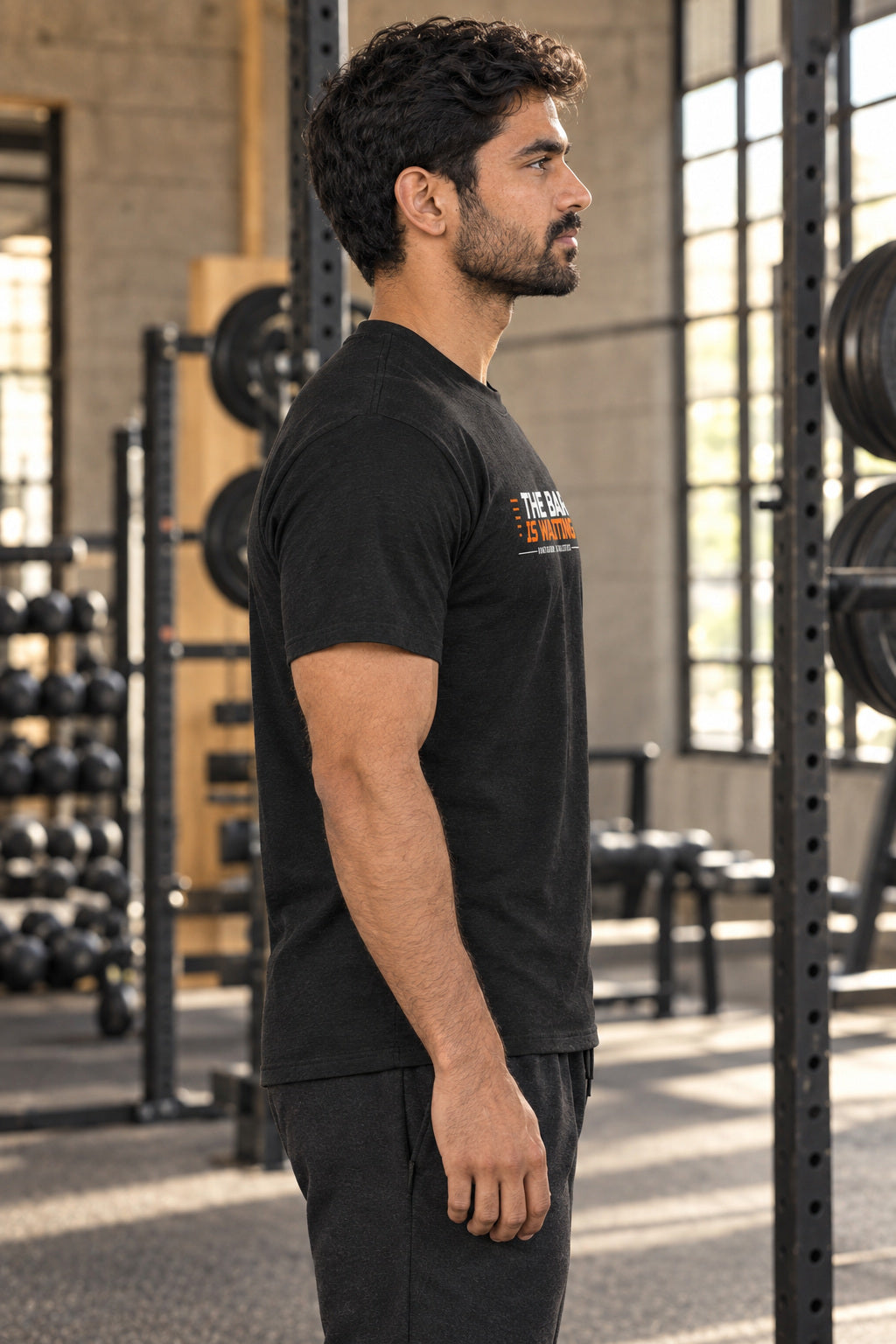 The Bar Is Waiting | Men's Graphic Gym T-Shirt, AI-generated side-profile product mockup on a fictional adult model