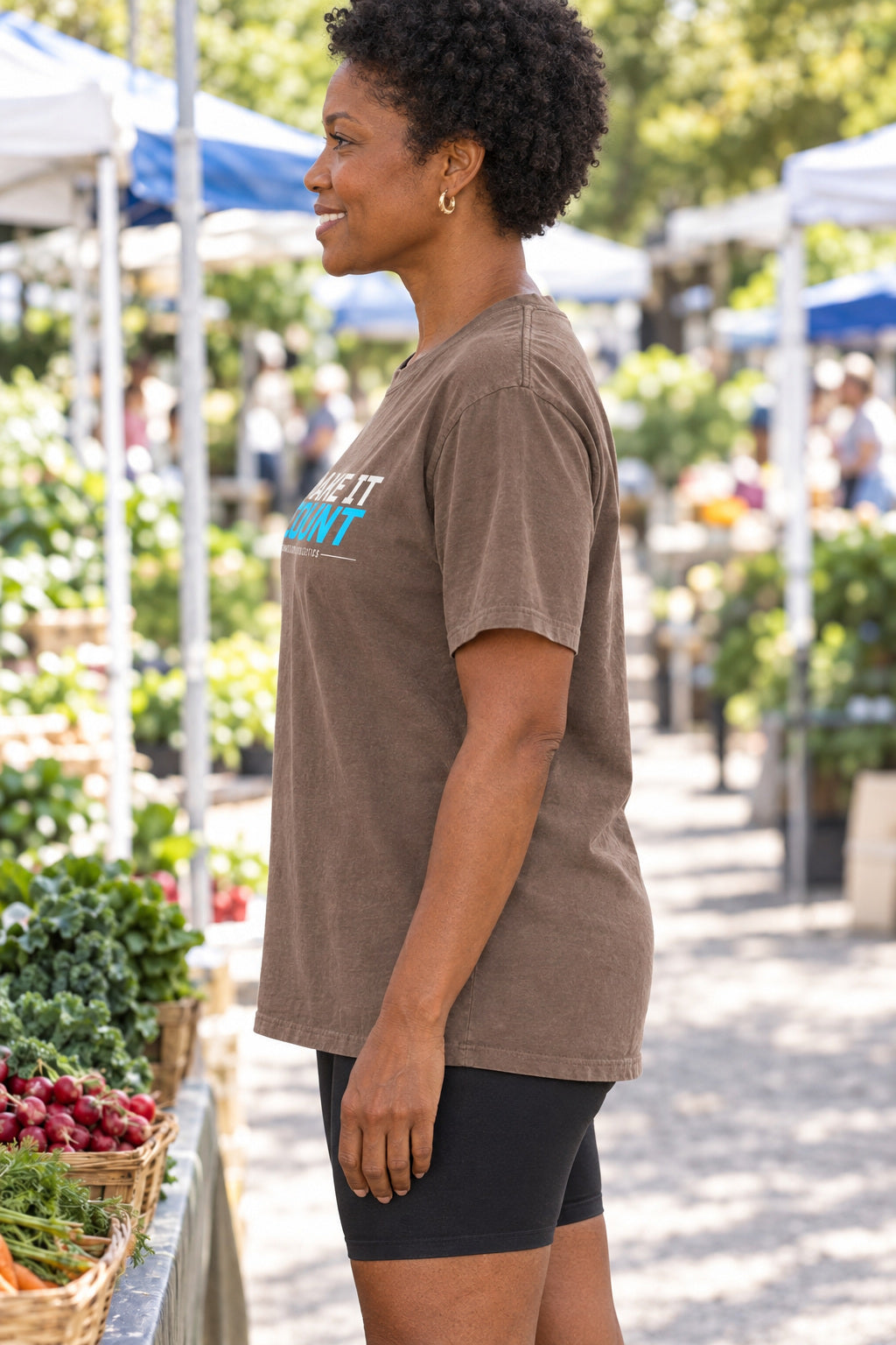 Make It Count | Women's Garment-Dyed Graphic Tee, AI-generated side-profile product mockup on a fictional adult model