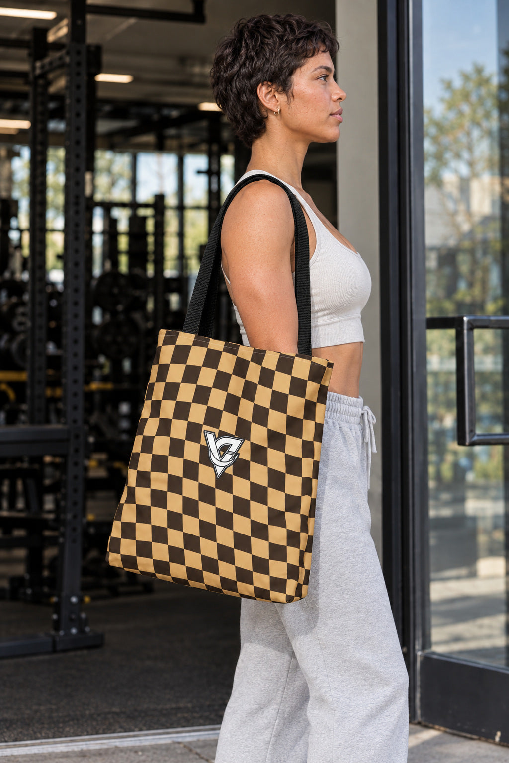 Desert Warp Check Tote Bag — All-Over Print Gym & Everyday Tote, AI-generated side-profile product mockup on a fictional adult model