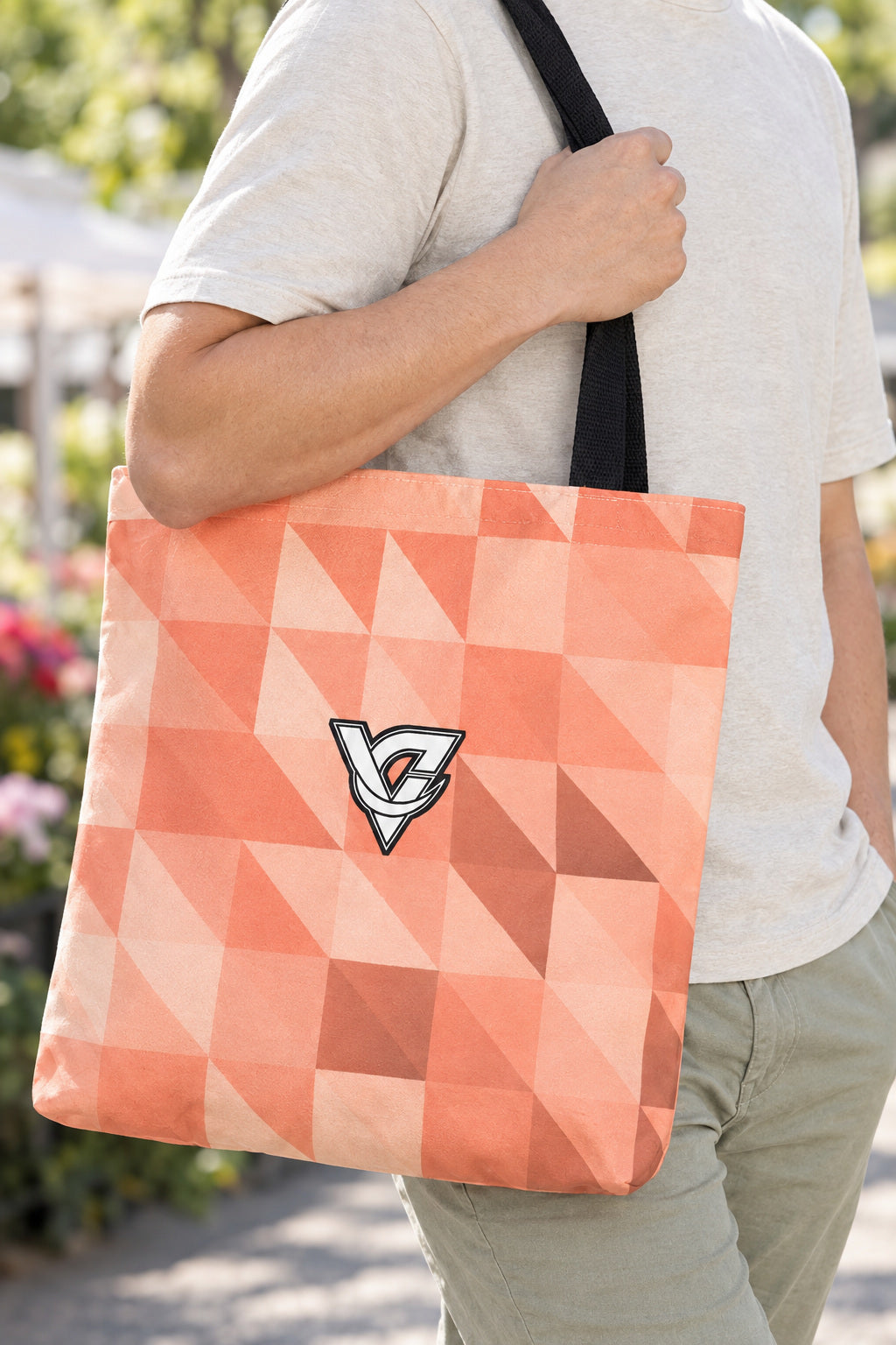 Peach Low-Poly Tote Bag — All-Over Print Gym & Everyday Tote, AI-generated realistic detail mockup on a fictional adult model