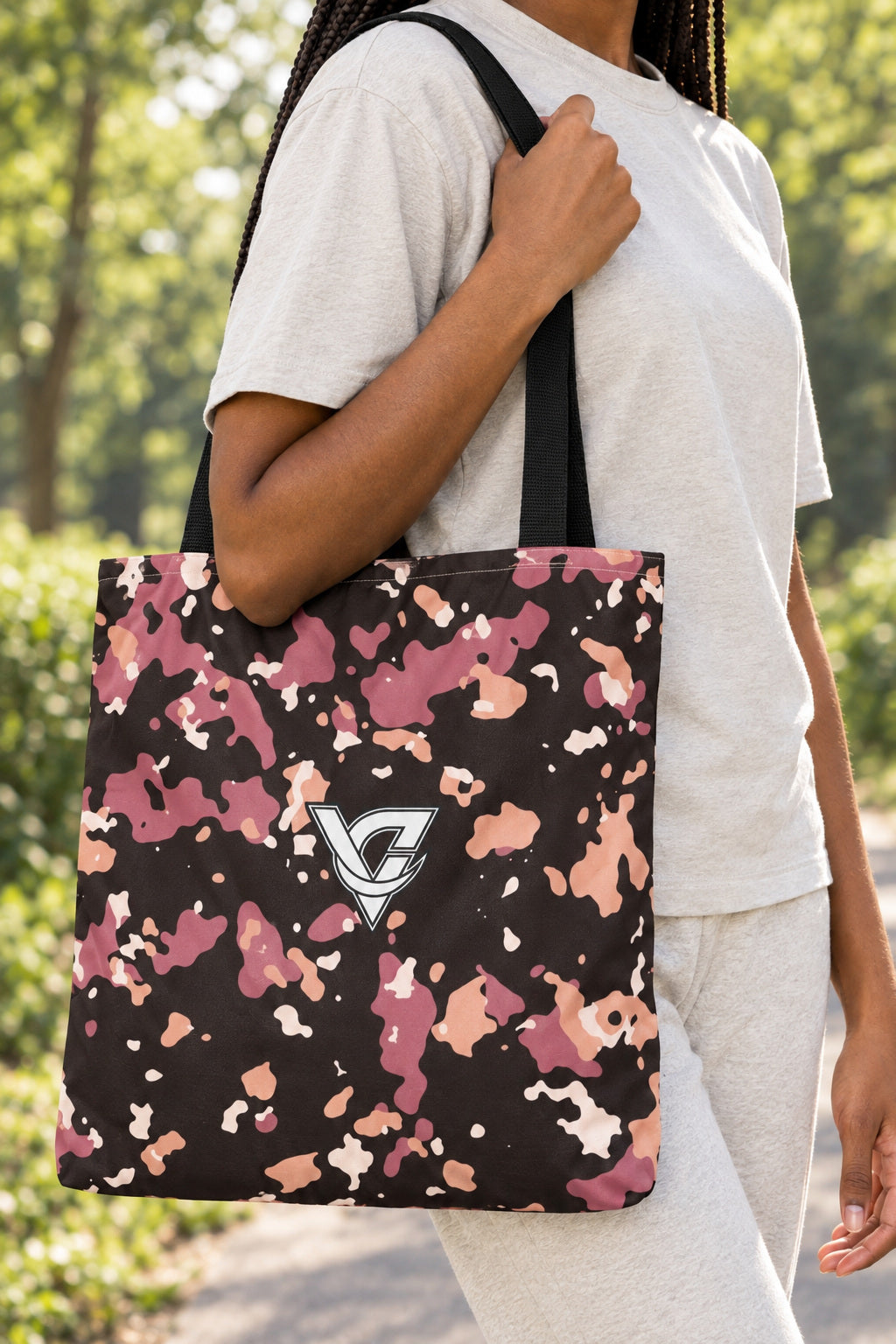 Rose Gold Splatter Tote Bag — All-Over Print Gym & Everyday Tote, AI-generated realistic detail mockup on a fictional adult model
