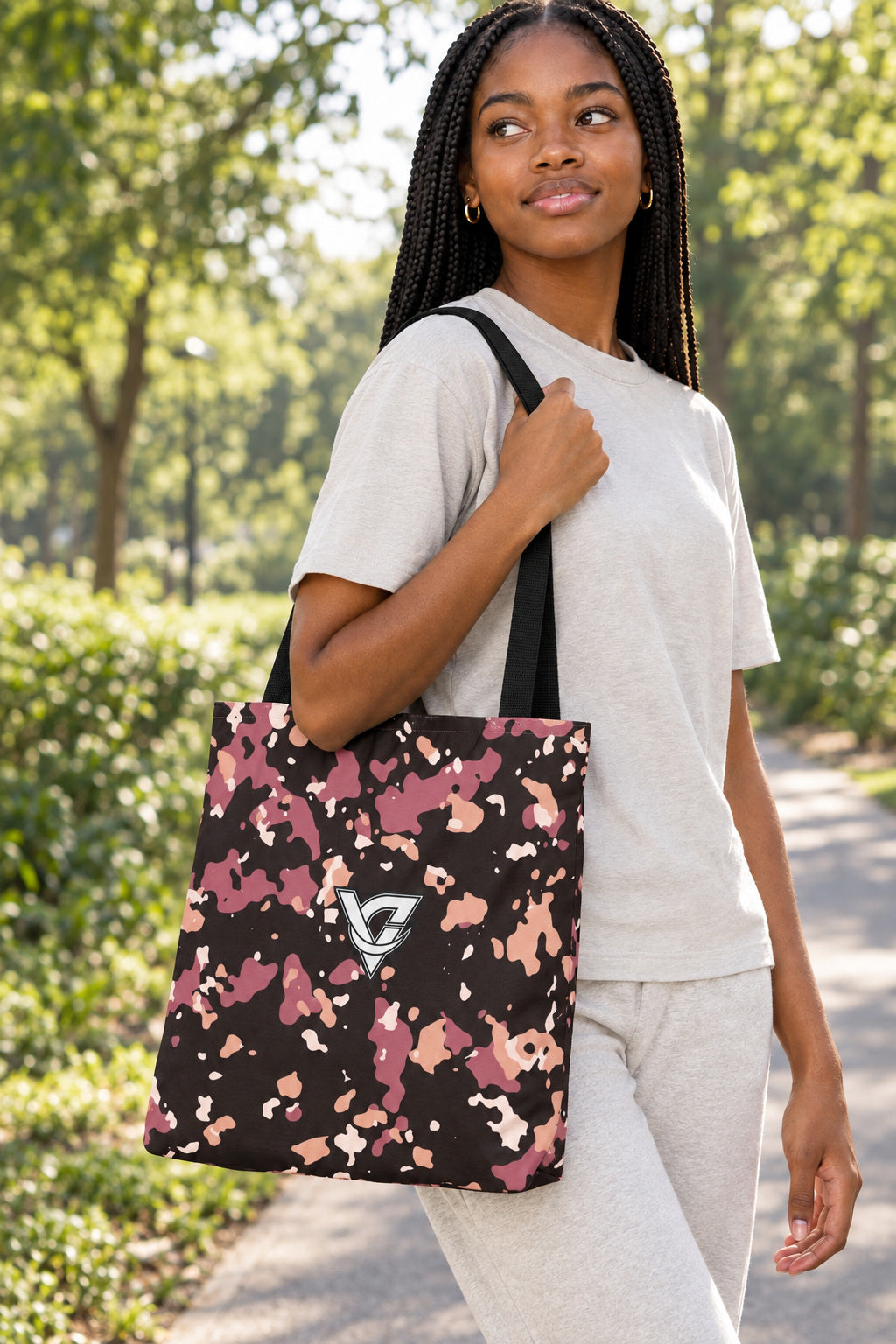 Rose Gold Splatter Tote Bag — All-Over Print Gym & Everyday Tote, AI-generated realistic three-quarter mockup on a fictional adult model