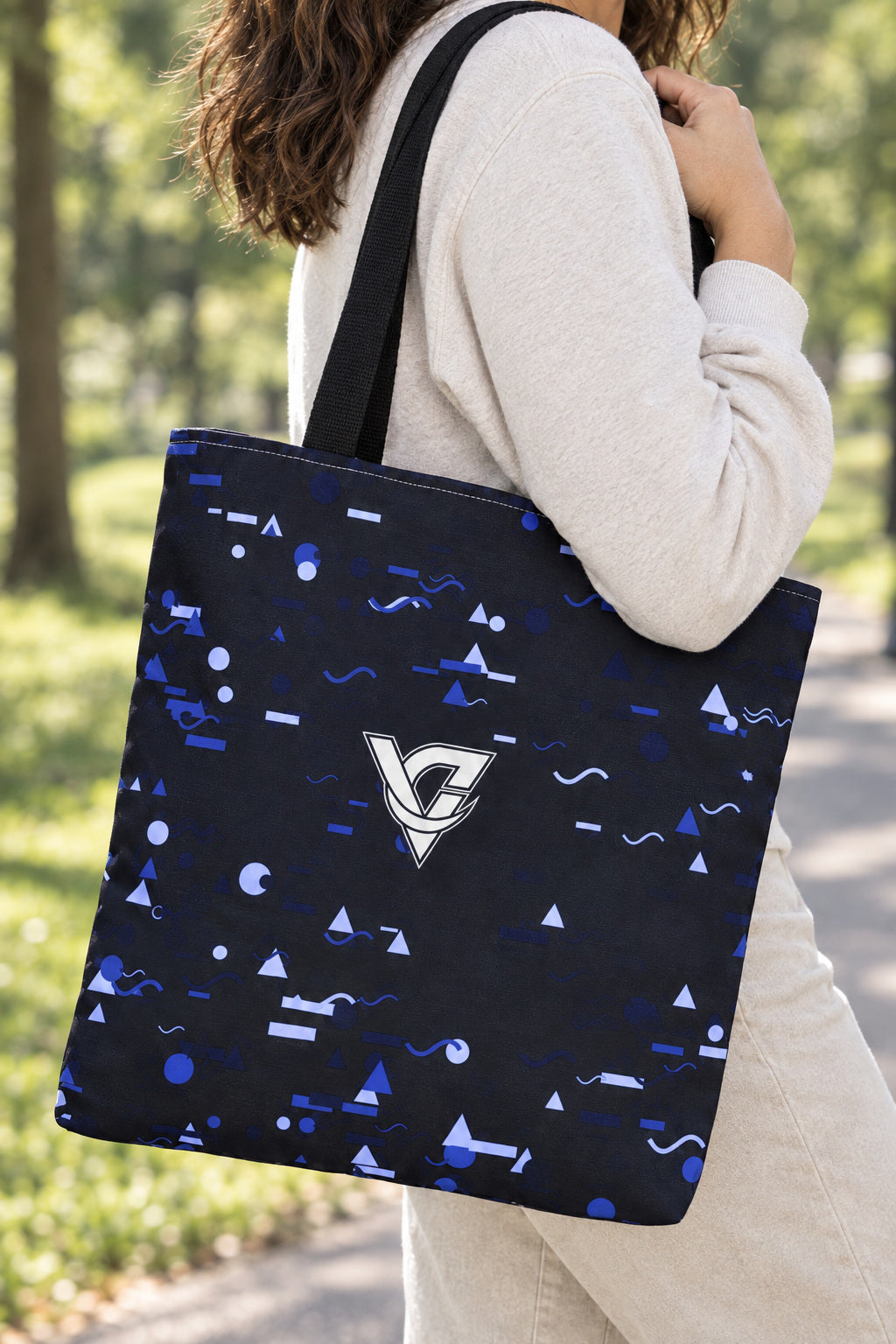 Midnight Confetti Tote Bag — All-Over Print Gym & Everyday Tote, AI-generated realistic detail mockup on a fictional adult model