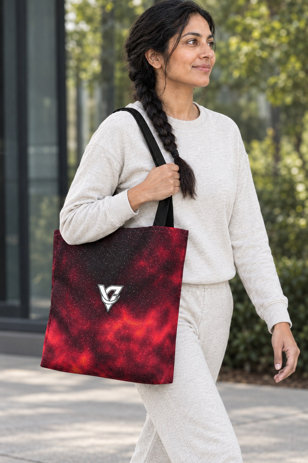 Infrared Galaxy Tote Bag — All-Over Print Gym & Everyday Tote, AI-generated realistic three-quarter mockup on a fictional adult model