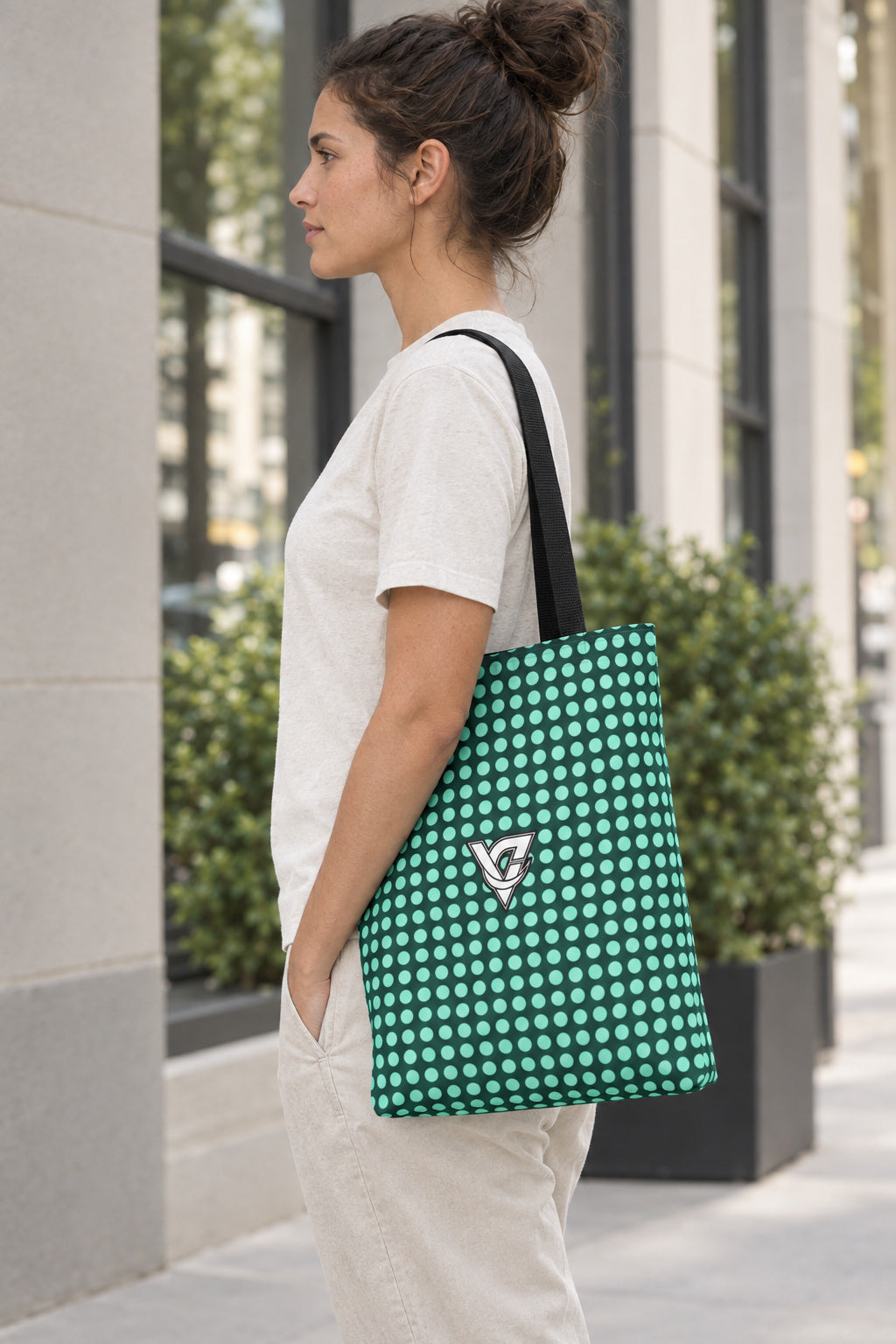 Mint Halftone Tote Bag — All-Over Print Gym & Everyday Tote, AI-generated side-profile product mockup on a fictional adult model