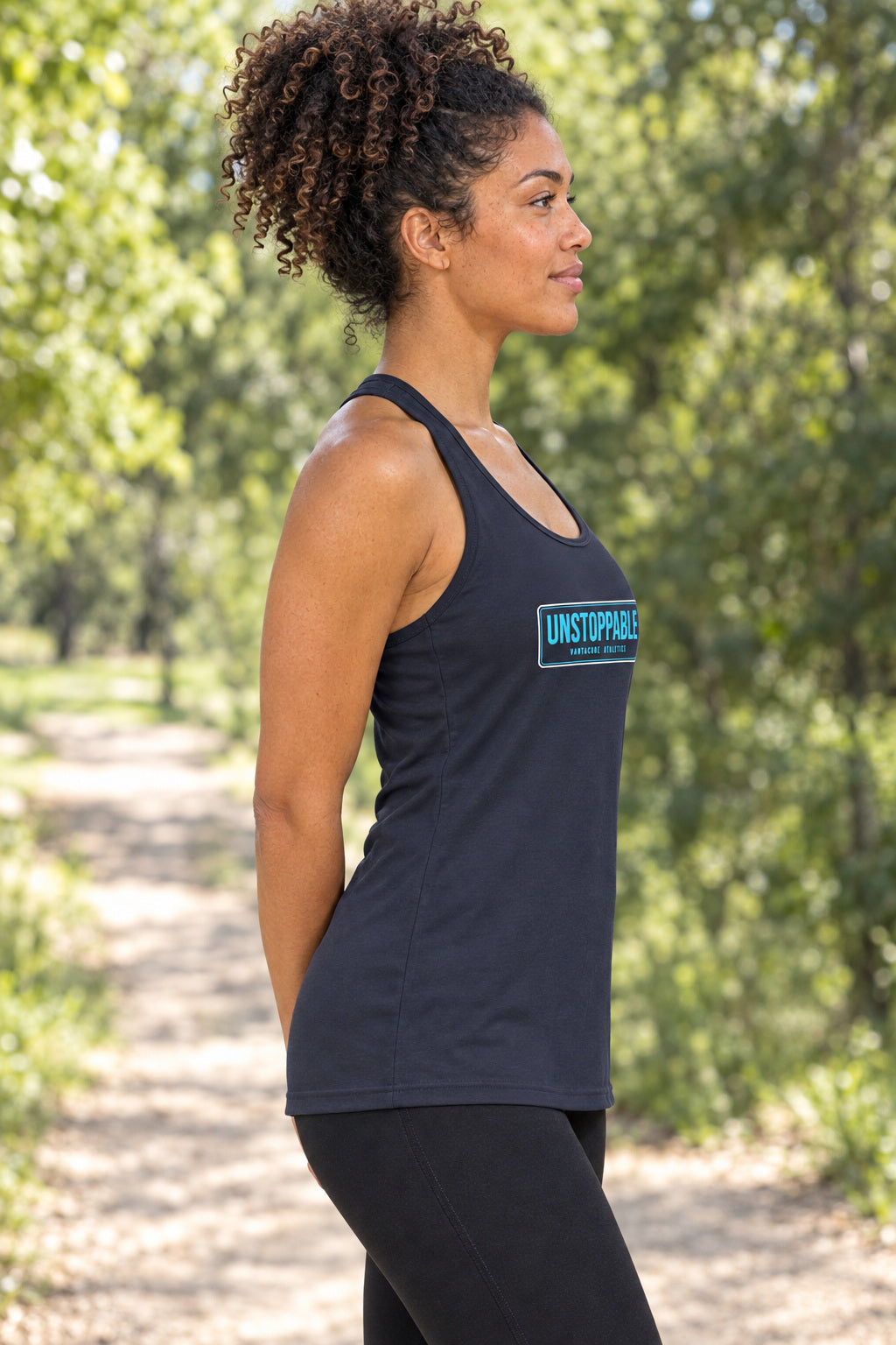 Unstoppable | Women's Performance Racerback Tank, AI-generated side-profile product mockup on a fictional adult model