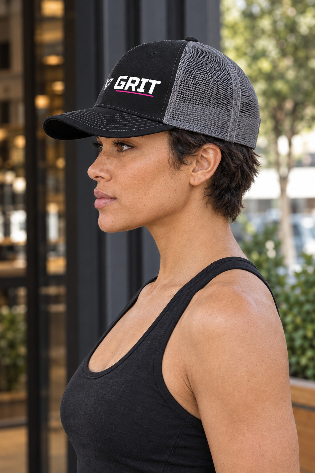 Grit Trucker Cap — Vantacore Snapback Hat, AI-generated side-profile product mockup on a fictional adult model
