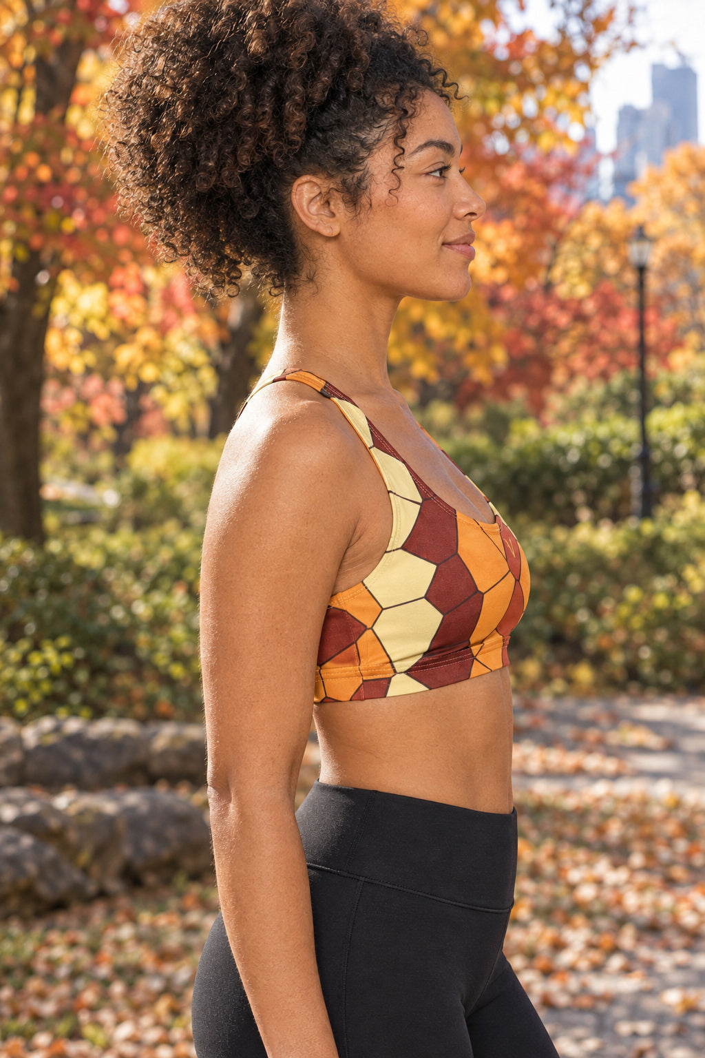 Golden Hour Mosaic Sports Bra, AI-generated side-profile product mockup on a fictional adult model