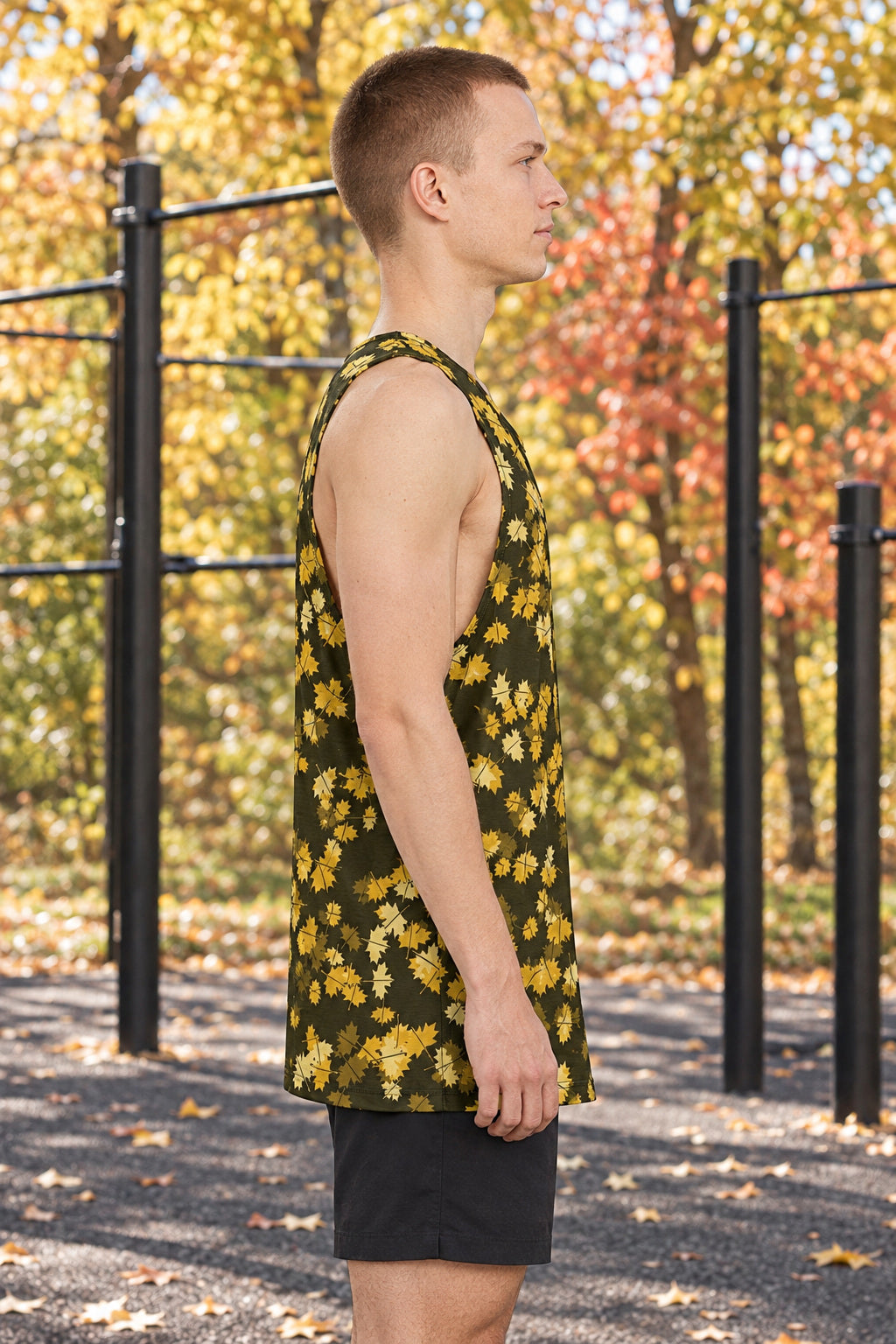 Mustard Falling Leaves Men's Athletic Tank, AI-generated side-profile product mockup on a fictional adult model