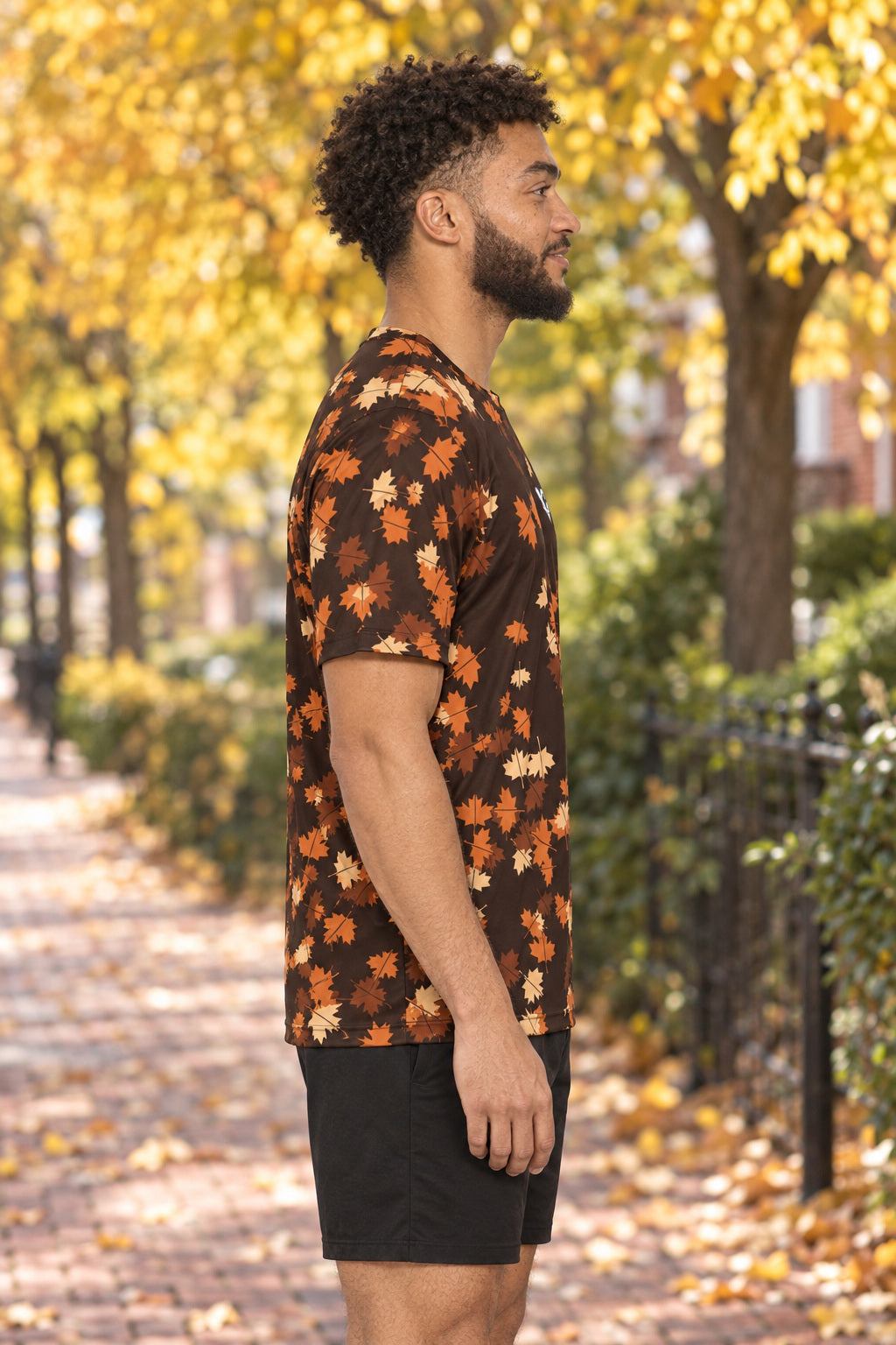 Copper Falling Leaves Multipurpose Athletic Shirt, AI-generated side-profile product mockup on a fictional adult model