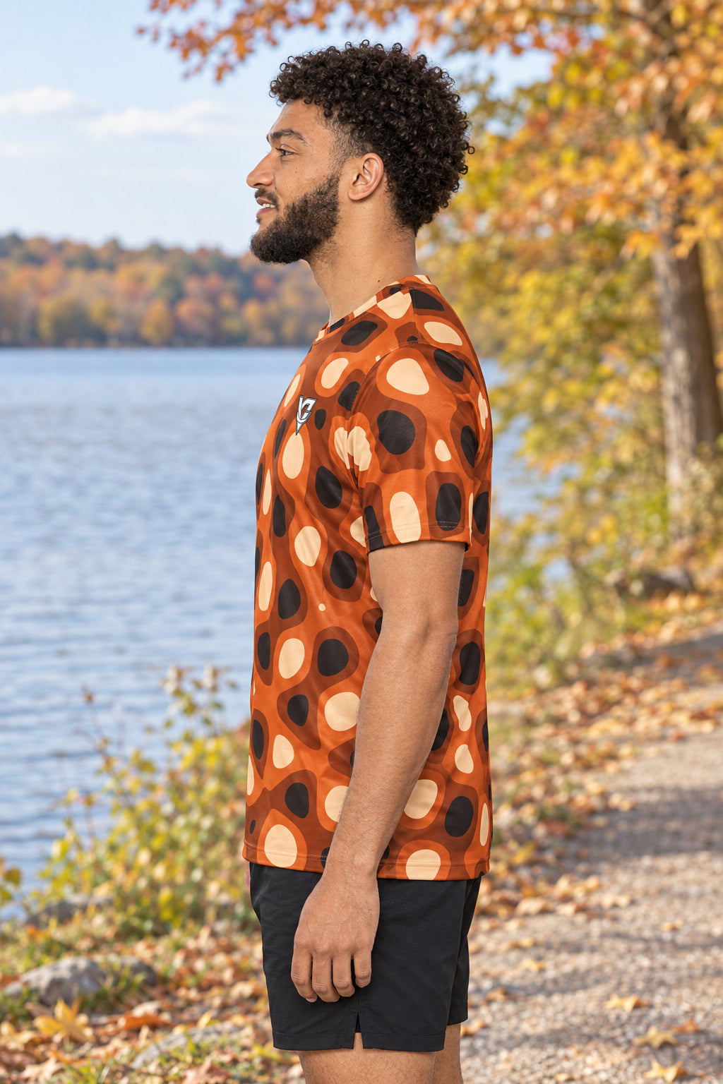 Cinnamon Ripple Multipurpose Athletic Shirt, AI-generated side-profile product mockup on a fictional adult model