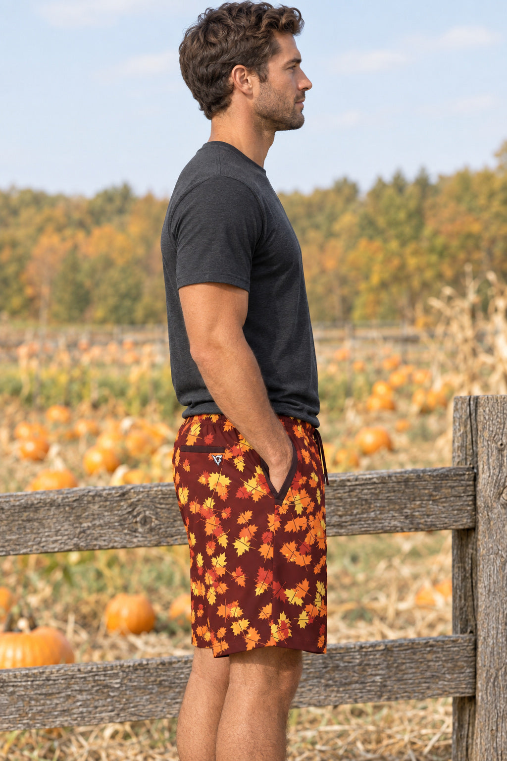 Men's Sunset Orchard Falling Leaves Performance Jogger Athletic Shorts with Pockets, AI-generated side-profile product mockup on a fictional adult model