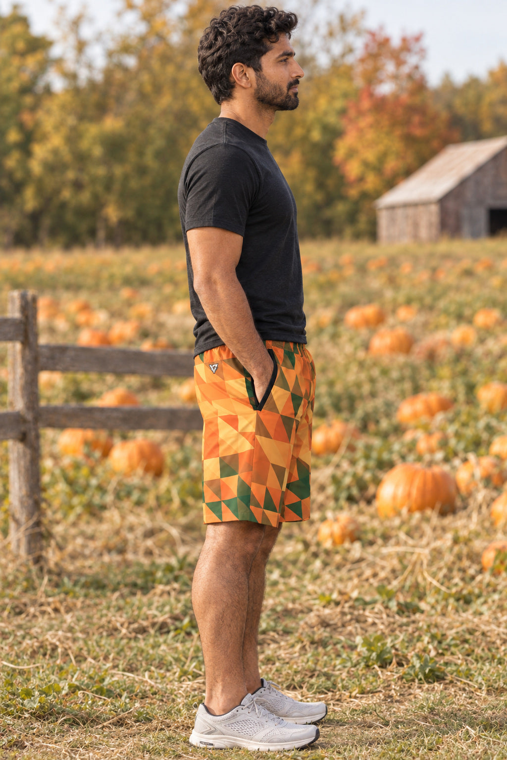 Men's Evergreen Ember Low-Poly Performance Jogger Athletic Shorts with Pockets, AI-generated side-profile product mockup on a fictional adult model