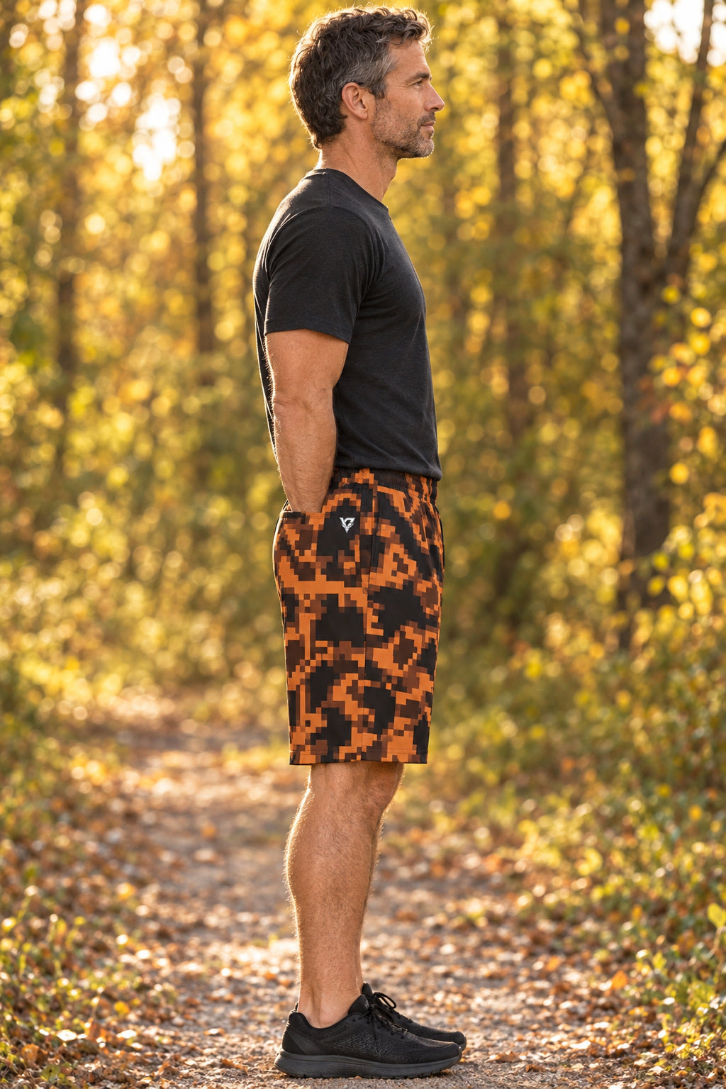 Men's Copper Digital Camo Performance Jogger Athletic Shorts with Pockets, AI-generated side-profile product mockup on a fictional adult model
