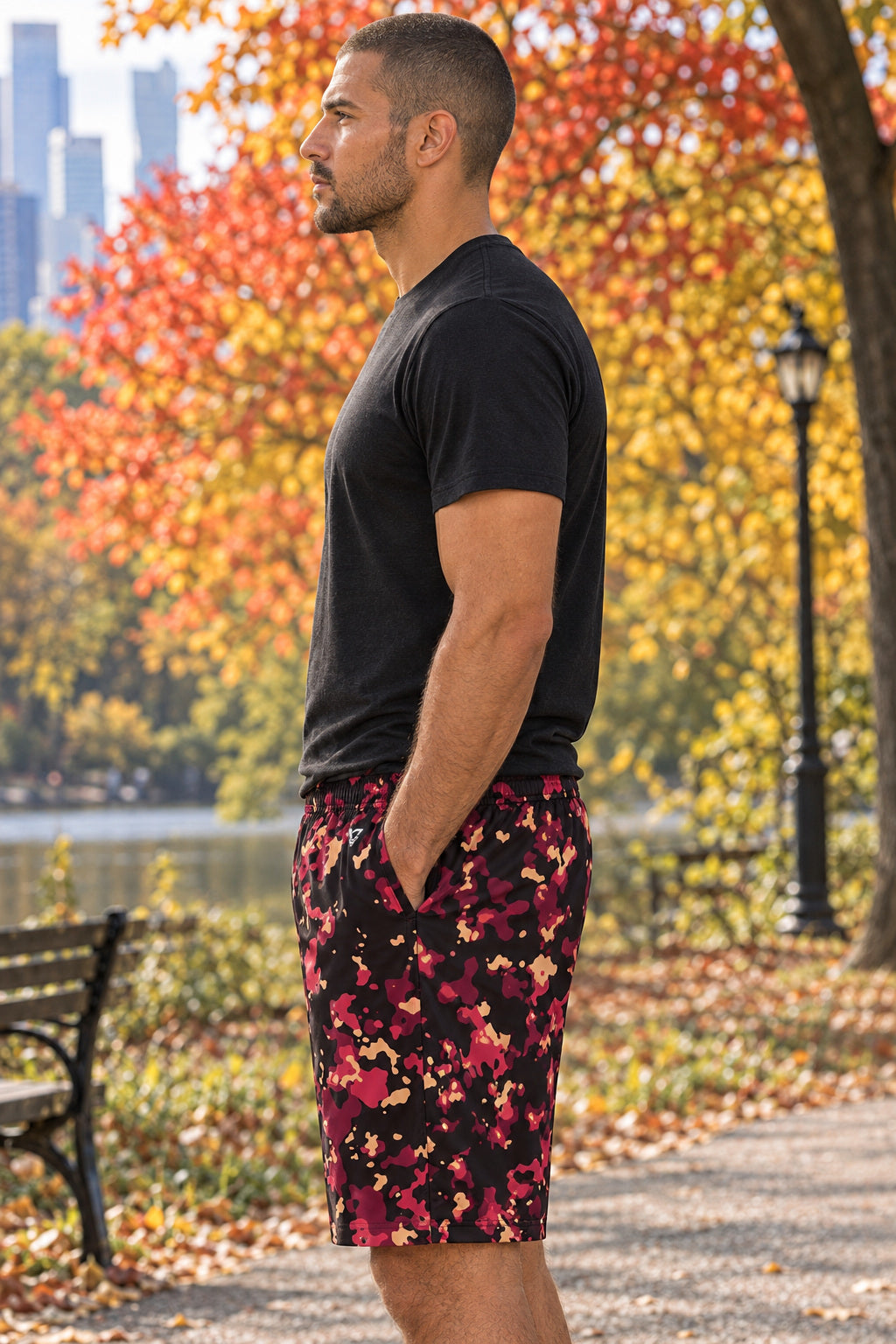 Men's Cranberry Splatter Performance Jogger Athletic Shorts with Pockets, AI-generated side-profile product mockup on a fictional adult model