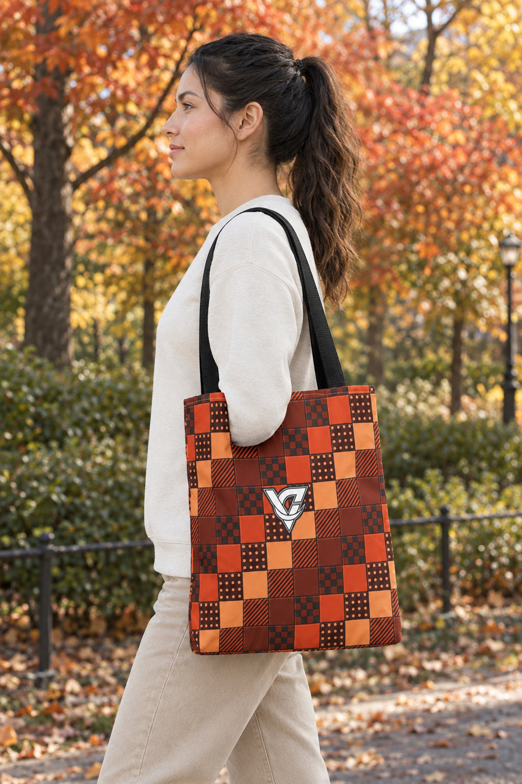 Rust Patchwork Tote Bag — All-Over Print Gym & Everyday Tote, AI-generated side-profile product mockup on a fictional adult model