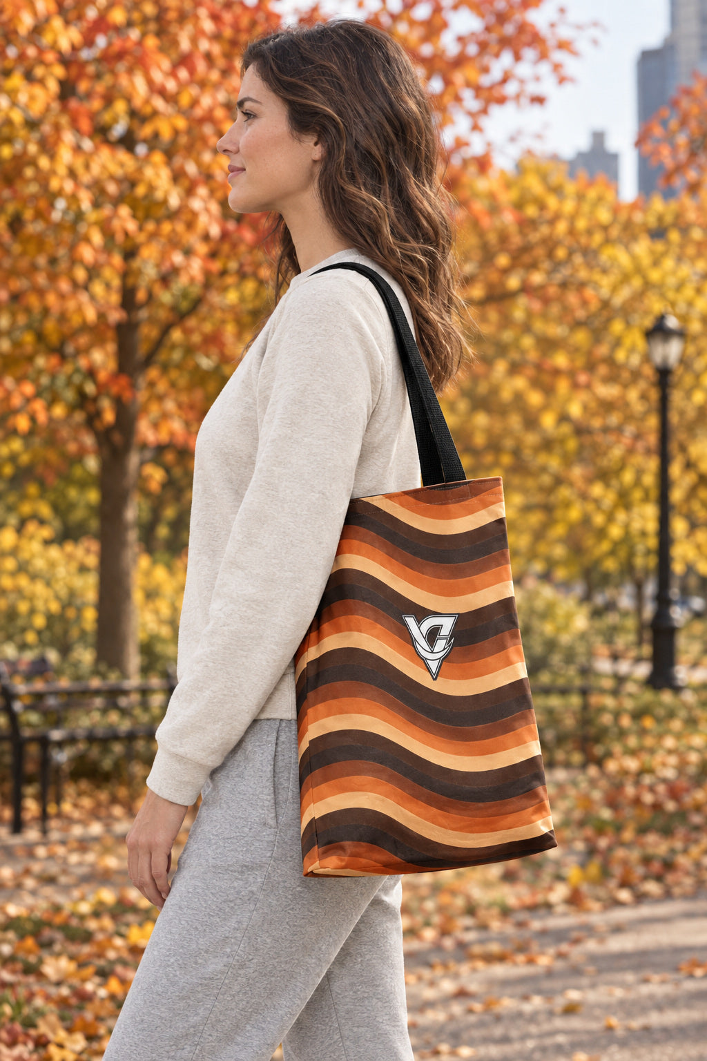 Copper Wave Tote Bag — All-Over Print Gym & Everyday Tote, AI-generated side-profile product mockup on a fictional adult model
